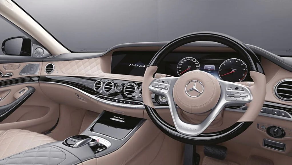 The dashboard has seamlessly integrated DIC and infotainment screen in Maybach S Class