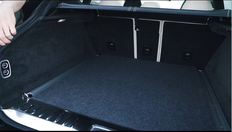 632litres of boot space in Aston Martin DBX with buttons to fold down the rear seats